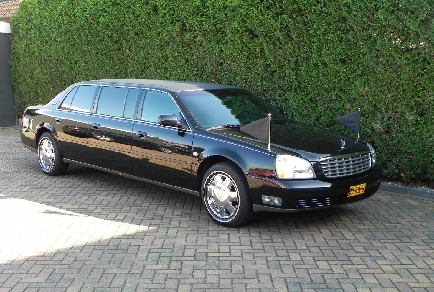 Cadillac zwart volgauto